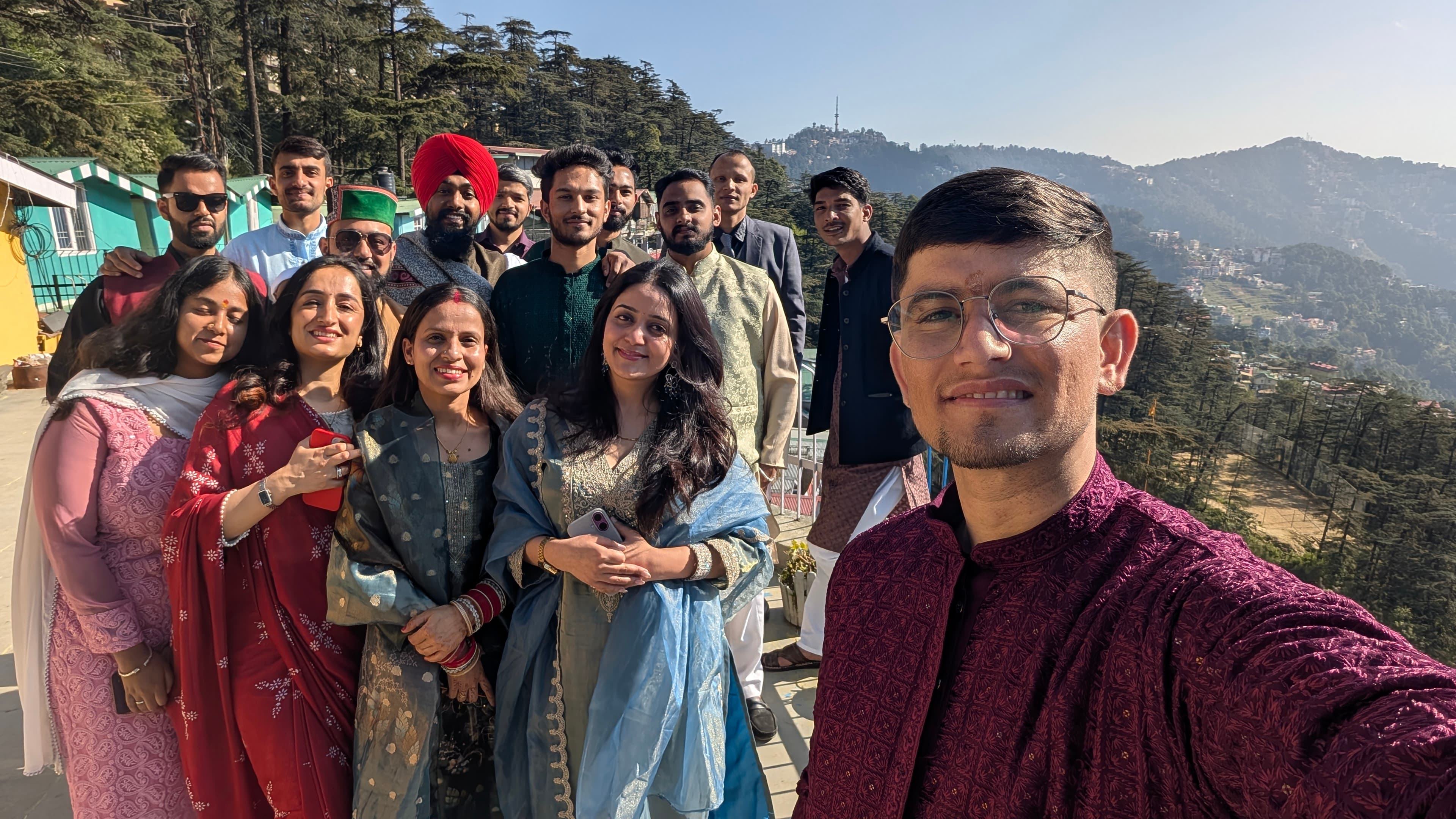 The Summerhill Technologies team, the Himalayan foothills behind them
